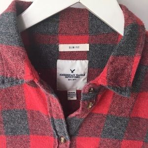 America’s Eagle red and grey plaid button up shirt